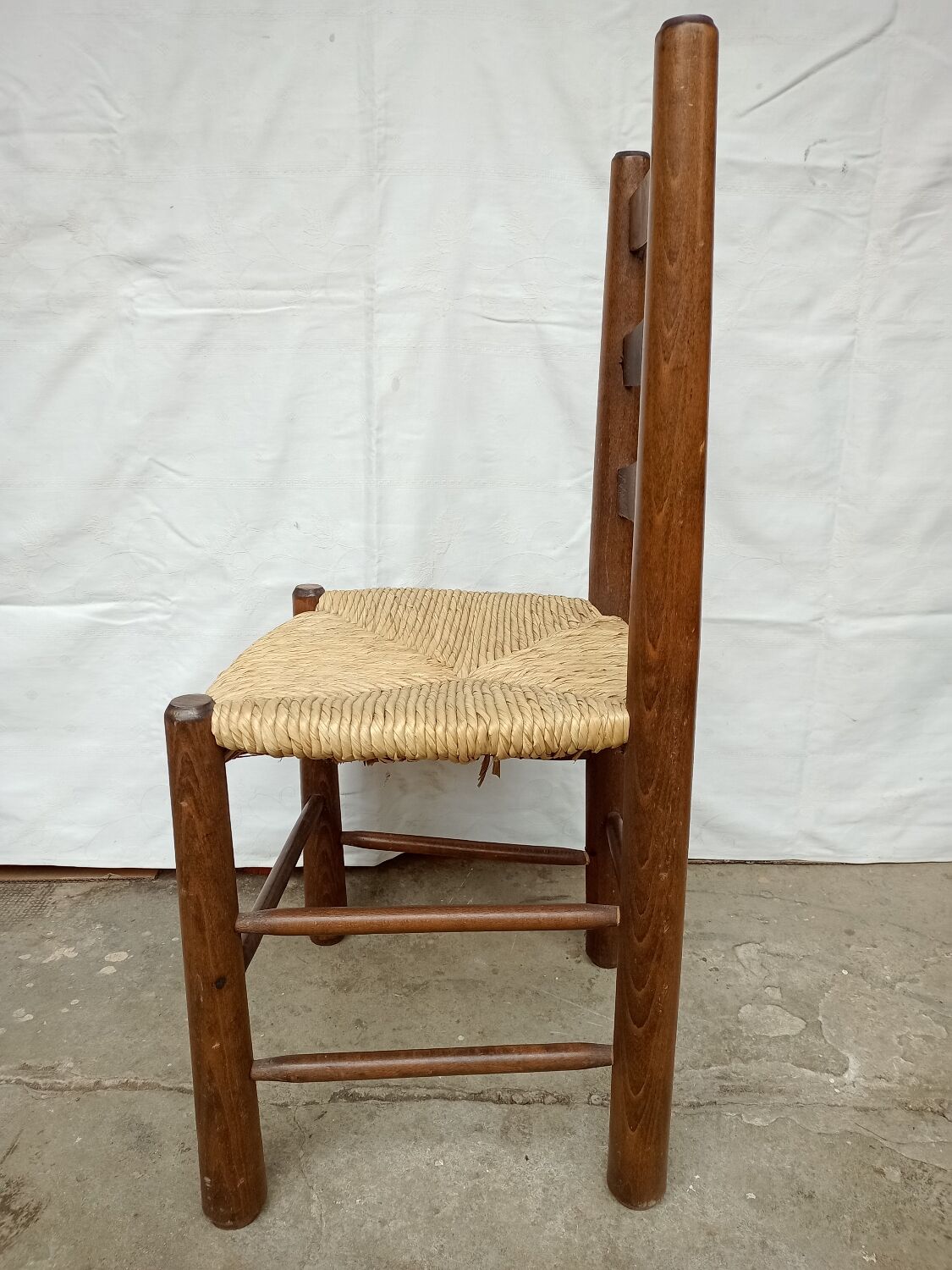 Brutalist chairs in walnut and straw
