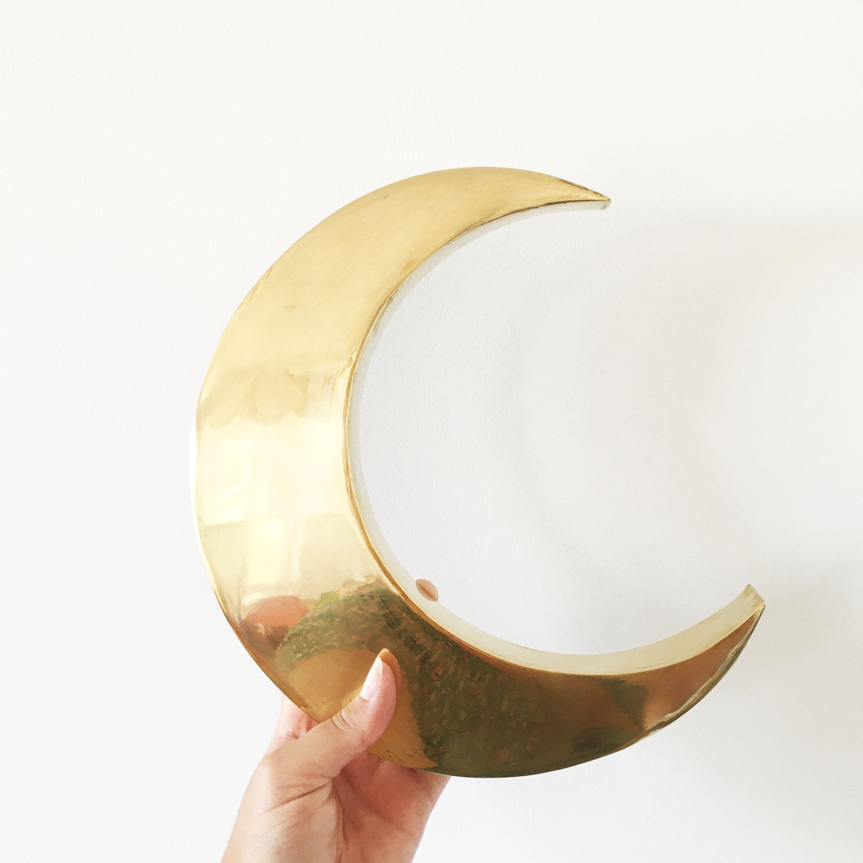 Moon or letter of sign "C" in vintage brass