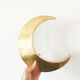 Moon or letter of sign "C" in vintage brass