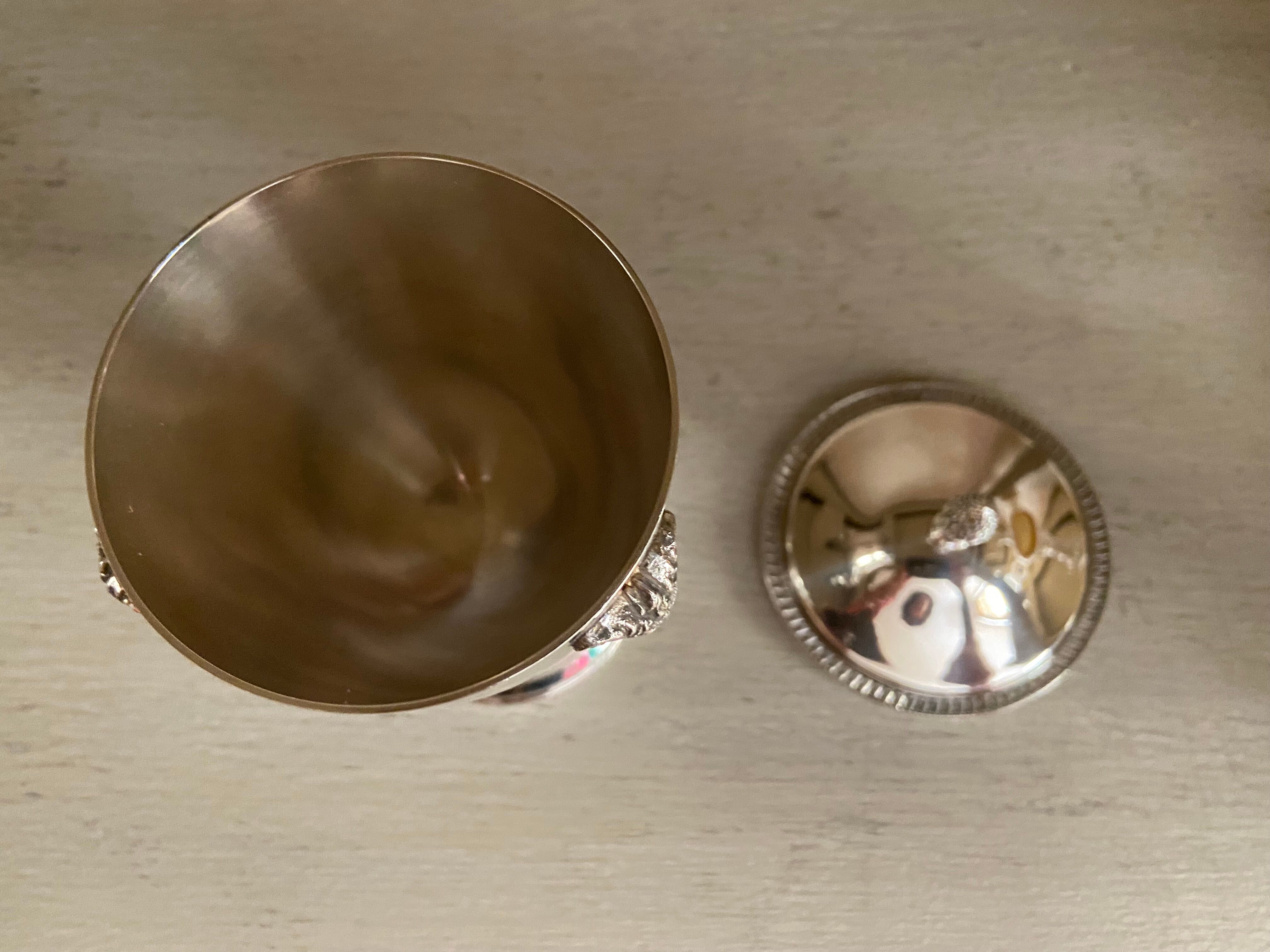 Silver metal sugar bowl on claws