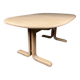 Oval extendable dining table in beech with Danish design.