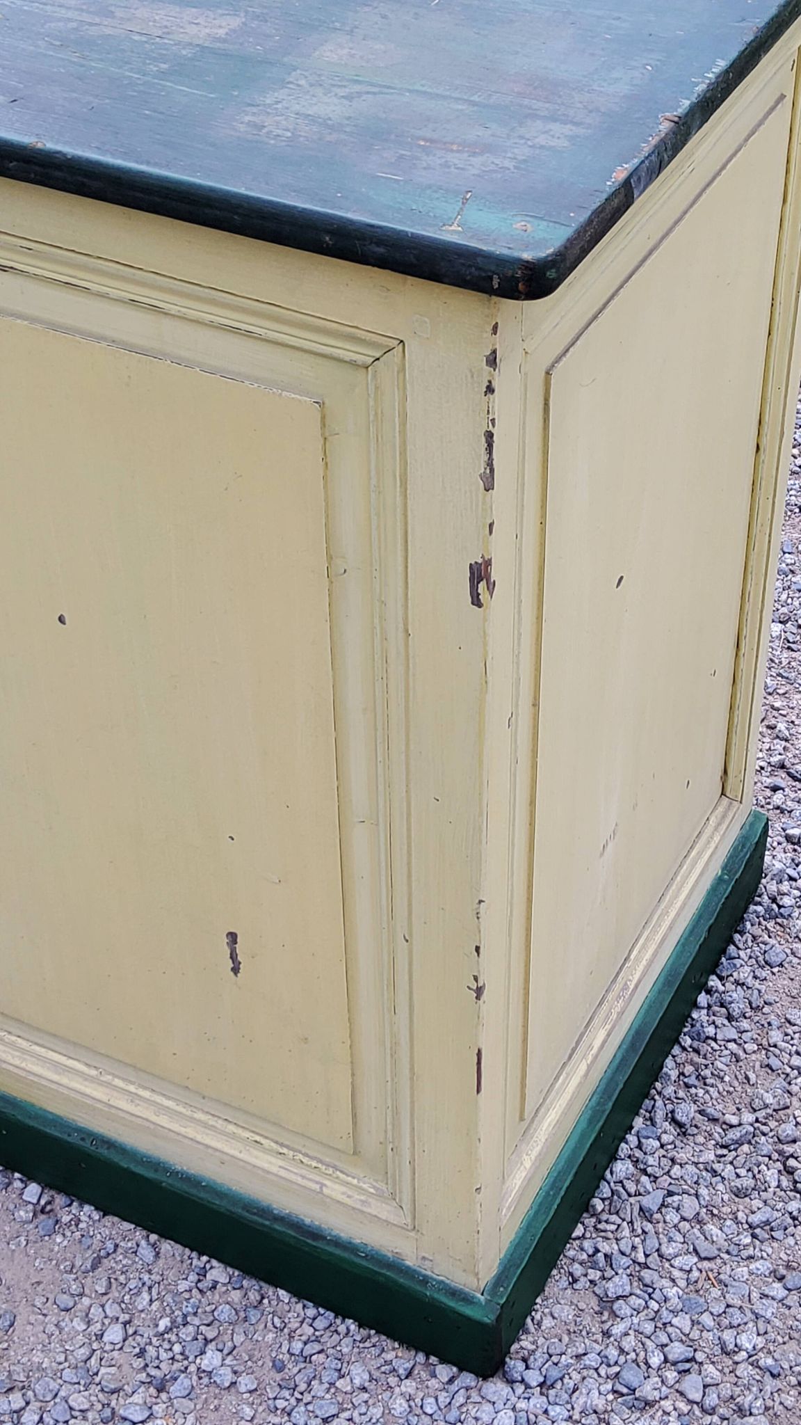 Late 19th century grocery counter in green and yellow patina painted wood
