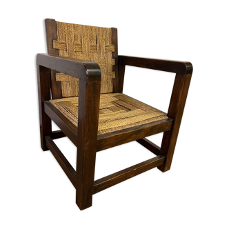 Wooden armchair and braided hemp ropes