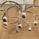 Sciolari chrome metal ceiling light with 8 light sources.