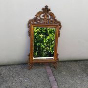 Old large Louis XV style mirror, stucco, wood, resin, beveled