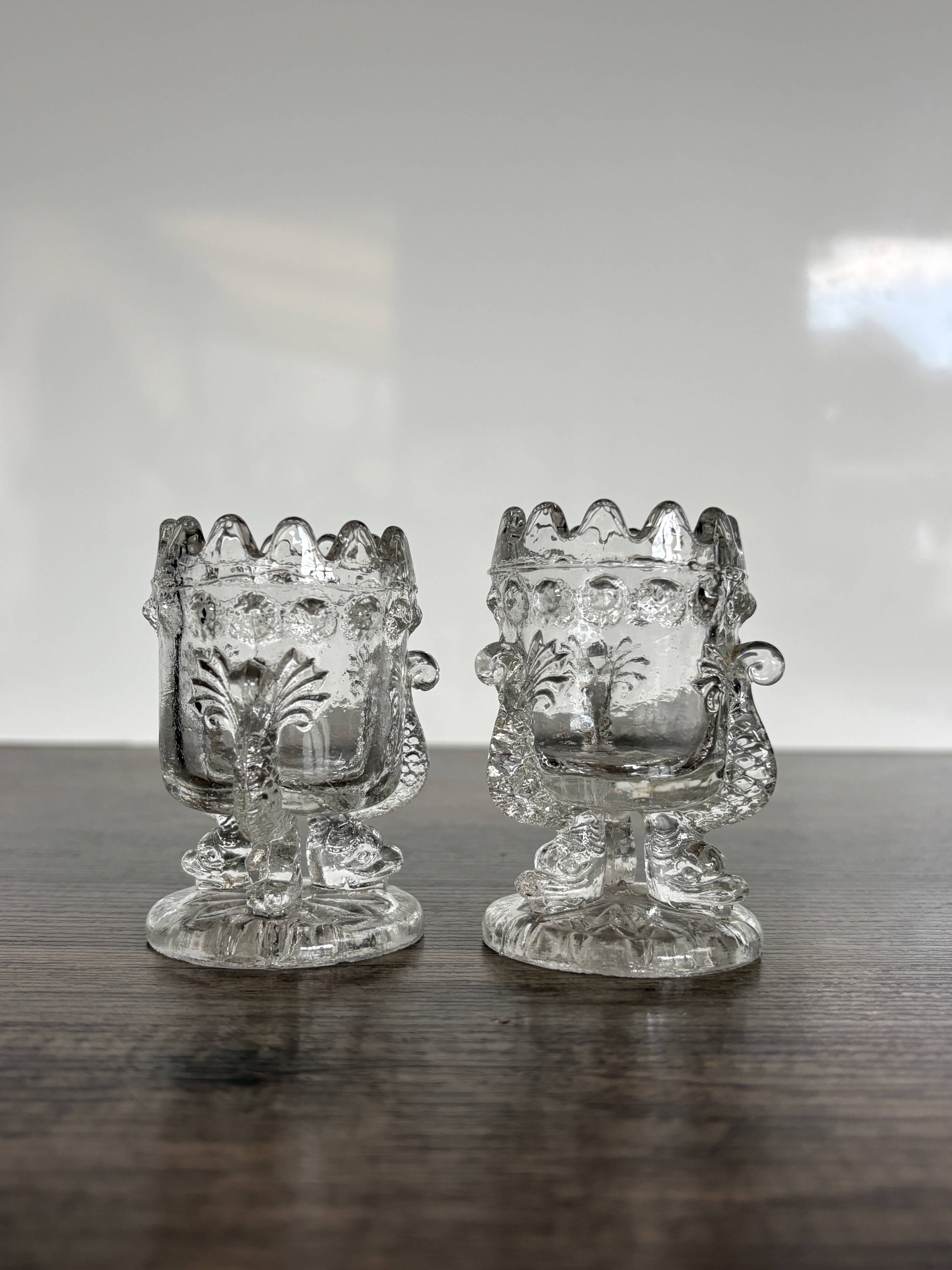 Pair of antique moulded glass egg cups