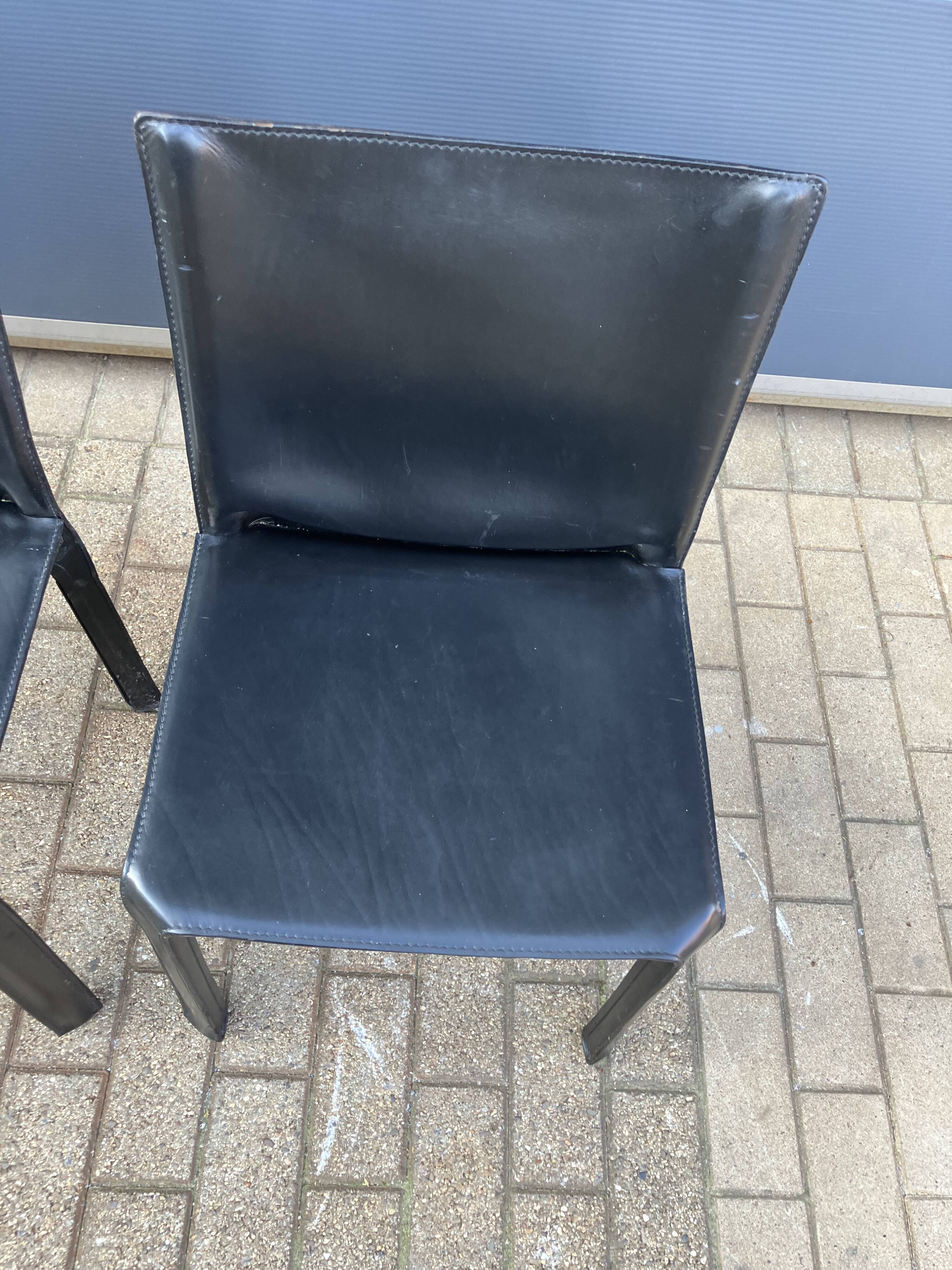 4 black Cassina Cab chairs by Mario Bellini