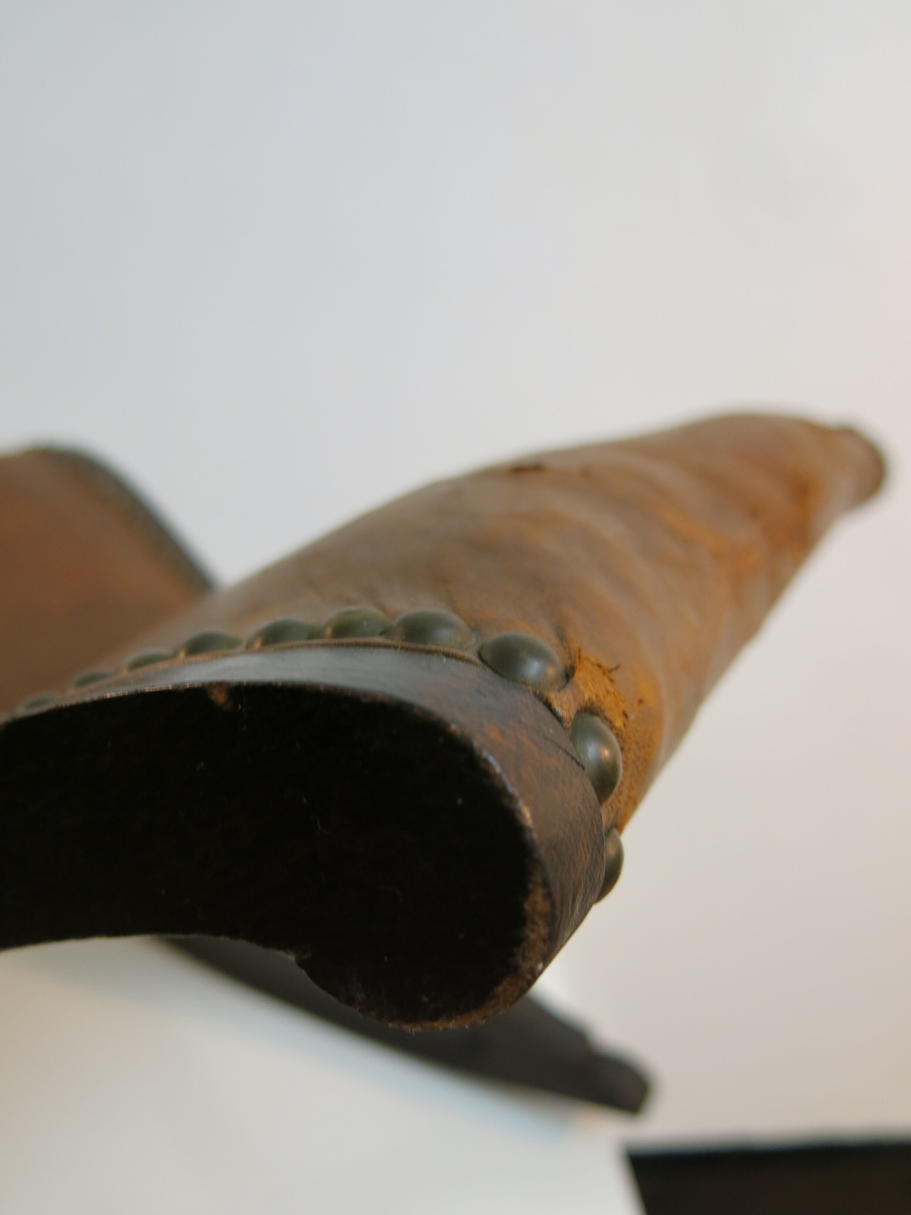 Studded leather rocking footrest