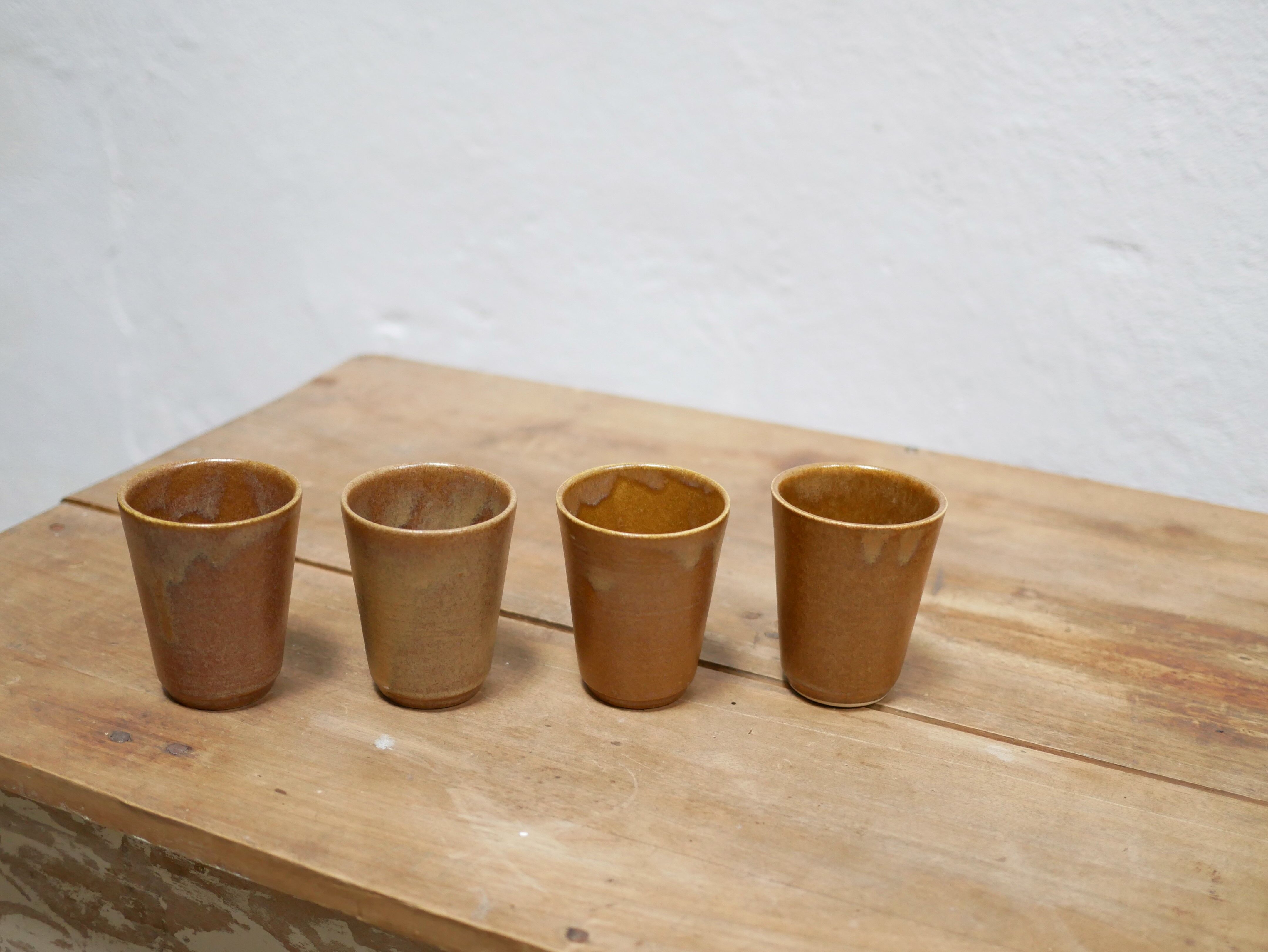 Series of 4 vintage stoneware glasses by the manufacture of Digoin, France