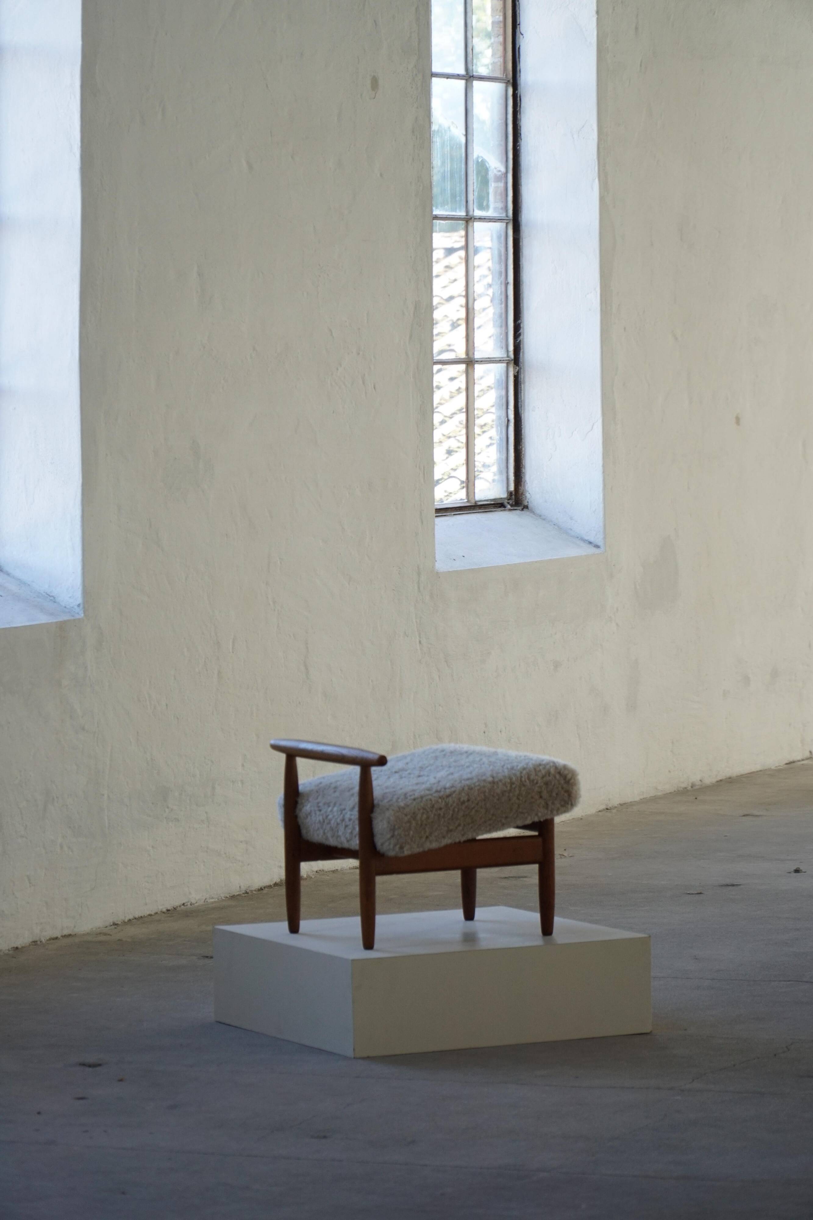 Eivind A. Johansen, oak footrest with light lambswool padding for FDB Møbler