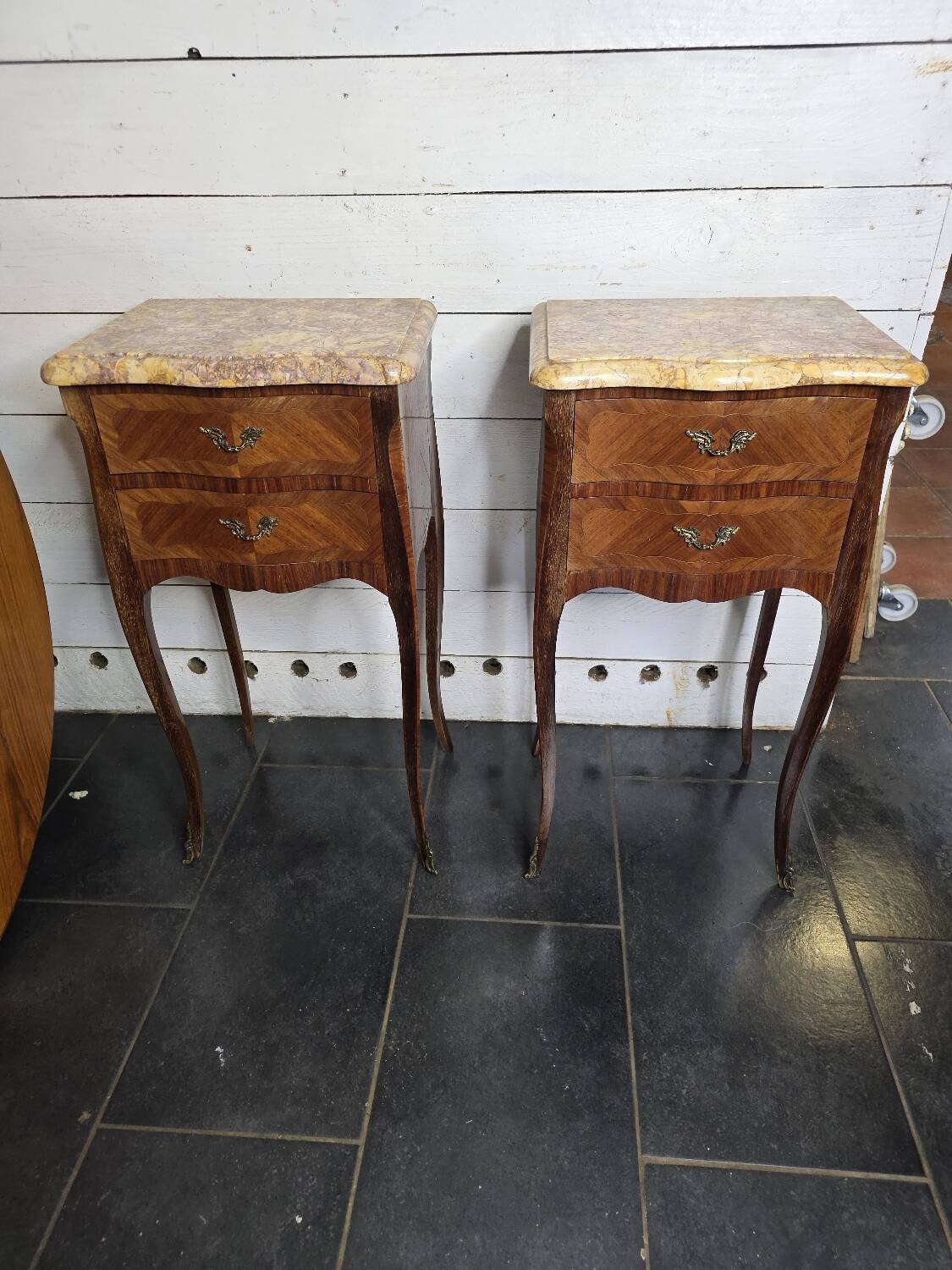 Pair of Louis XV style curved bedside tables in marquetry