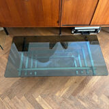 70s design coffee table in rectangular glass with chrome legs.