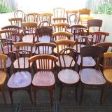 Set of 36 mismatched Bistrot chairs, 1920 to 1950, wooden seats.