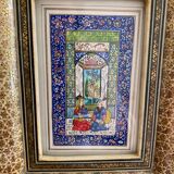 Oriental engraving with its gilded frame
