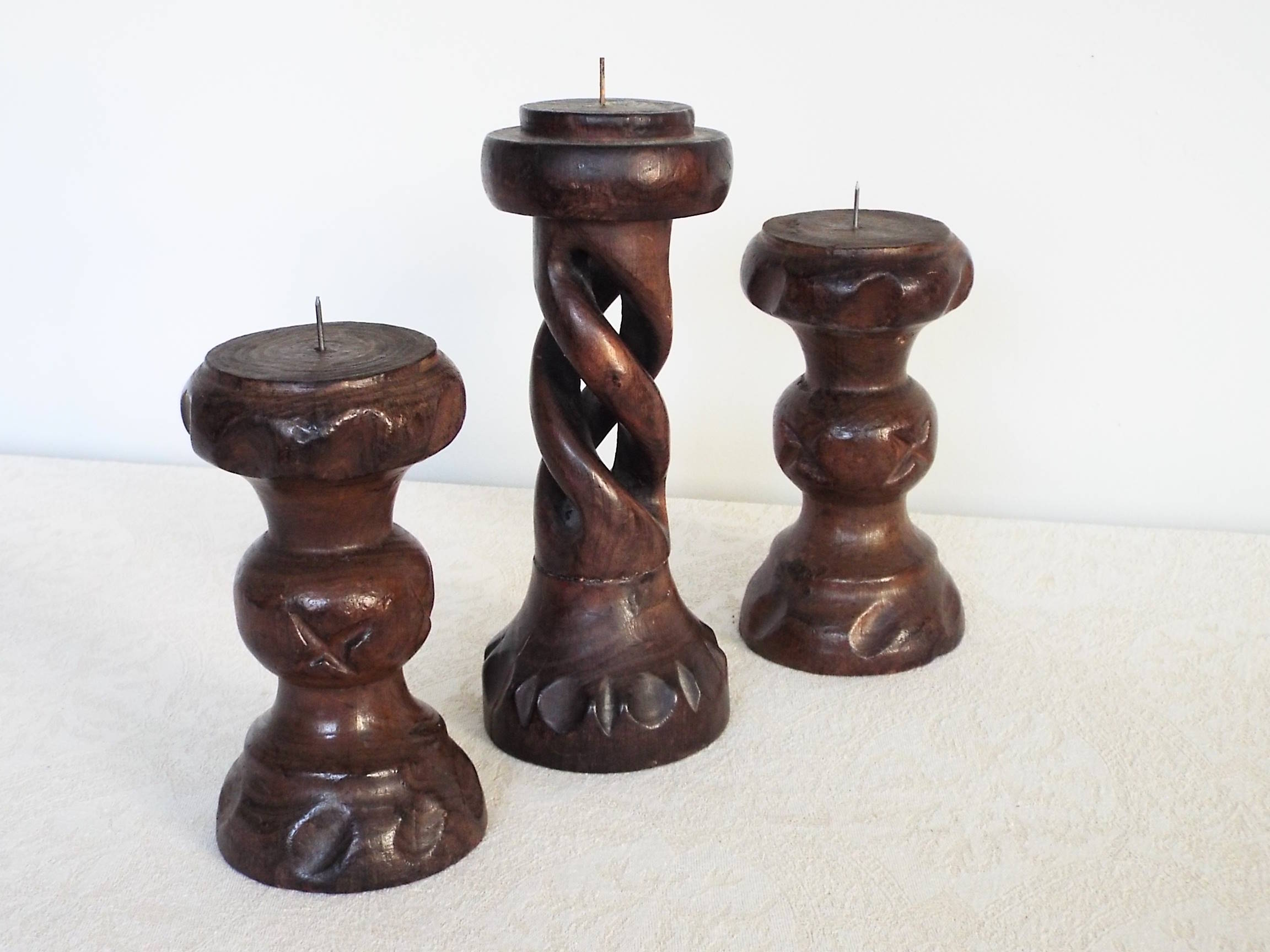 3 turned wooden candle holders