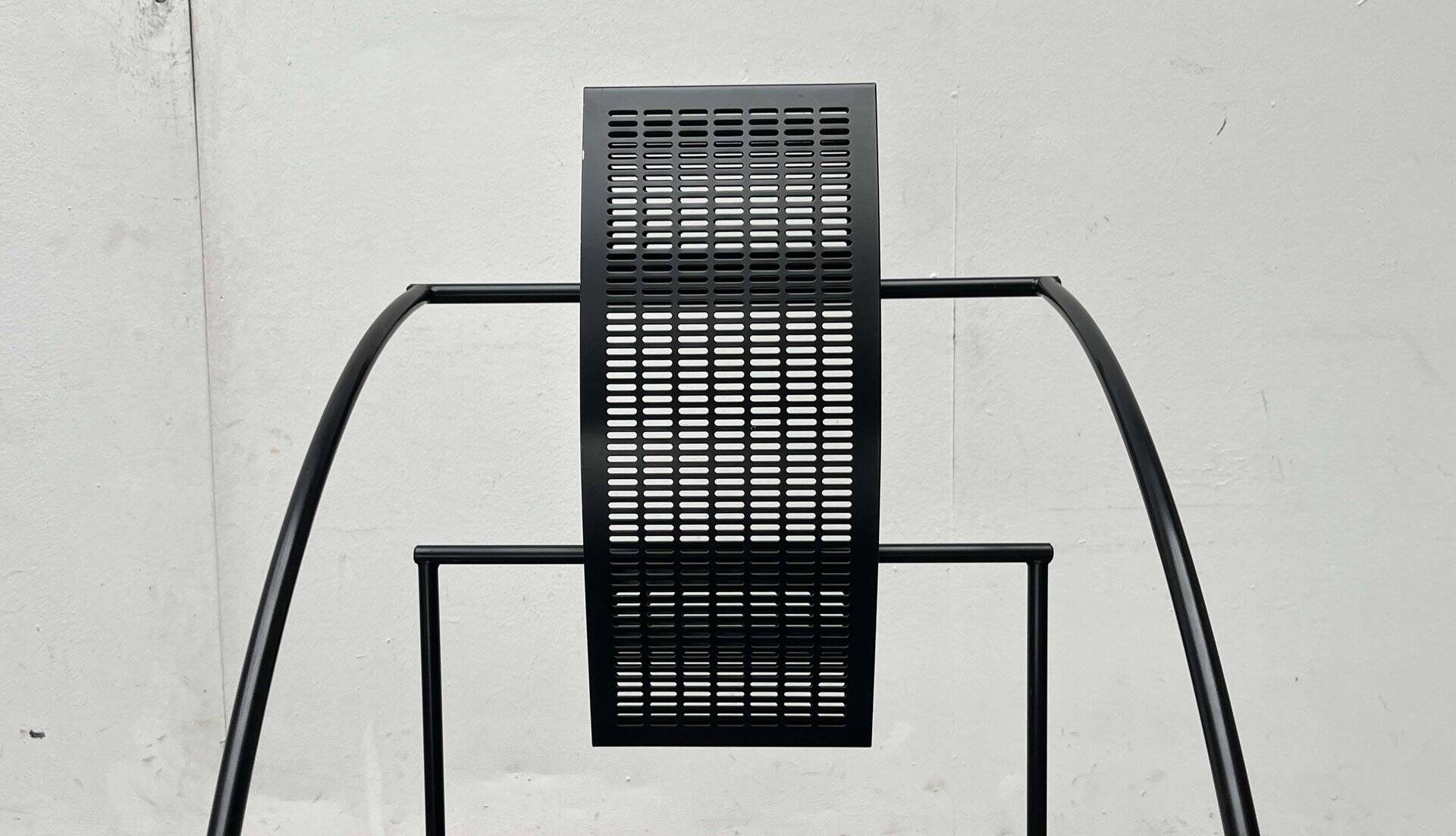 Postmodern black Quinta chair in perforated metal by Mario Botta for Alias, 1980s.