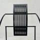 Postmodern black Quinta chair in perforated metal by Mario Botta for Alias, 1980s.