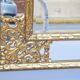 Miroir doré de style régence