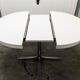 Table ronde transformable formica 70's pieds central