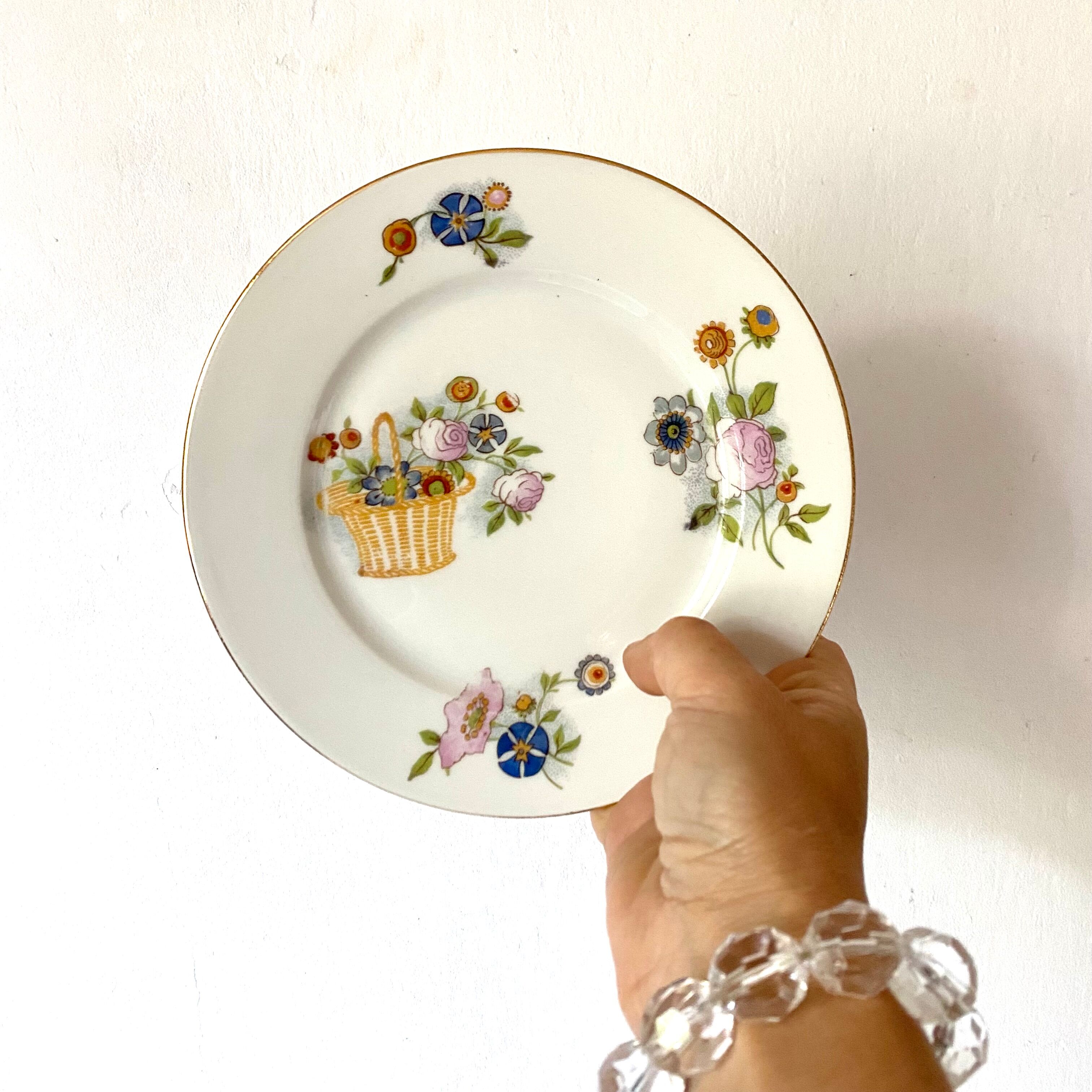 12 Assiettes à dessert en porcelaine de Limoges