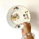 12 Assiettes à dessert en porcelaine de Limoges