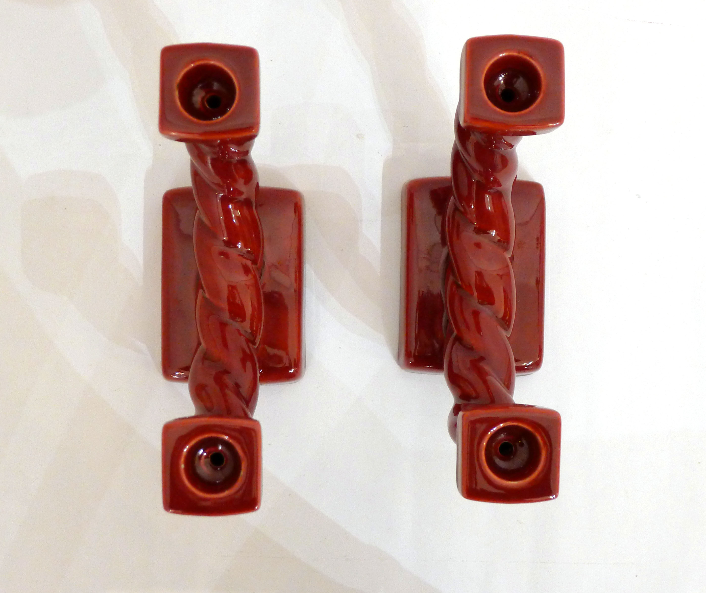 Pair of candlesticks twisted rope earthenware red 1950