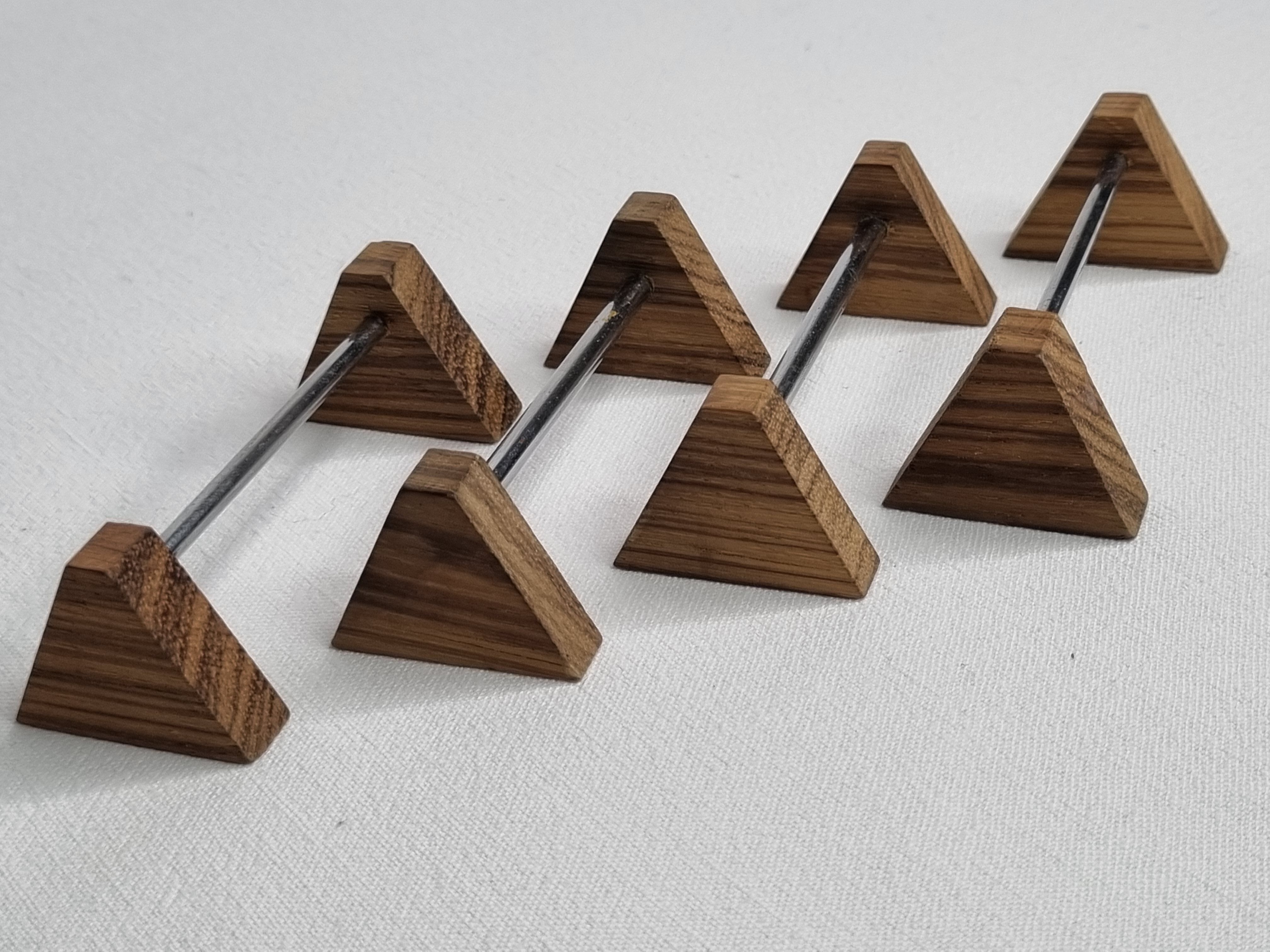 Set of four vintage metal and wood knife holders
