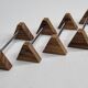 Set of four vintage metal and wood knife holders