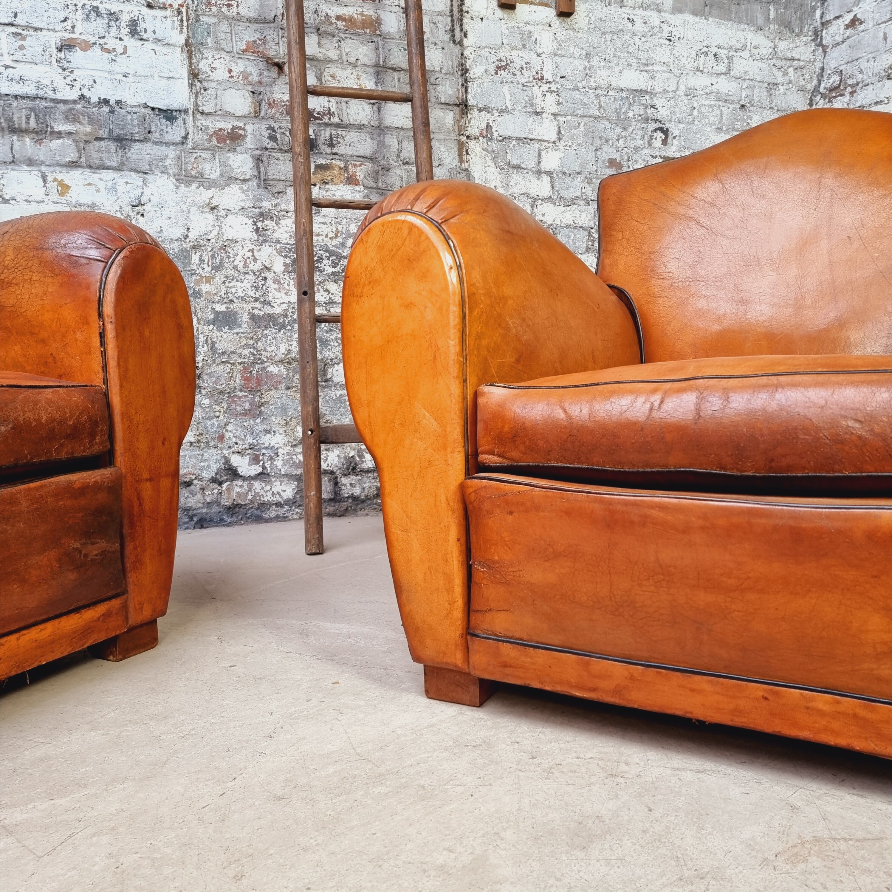 Pair of leather club chairs
