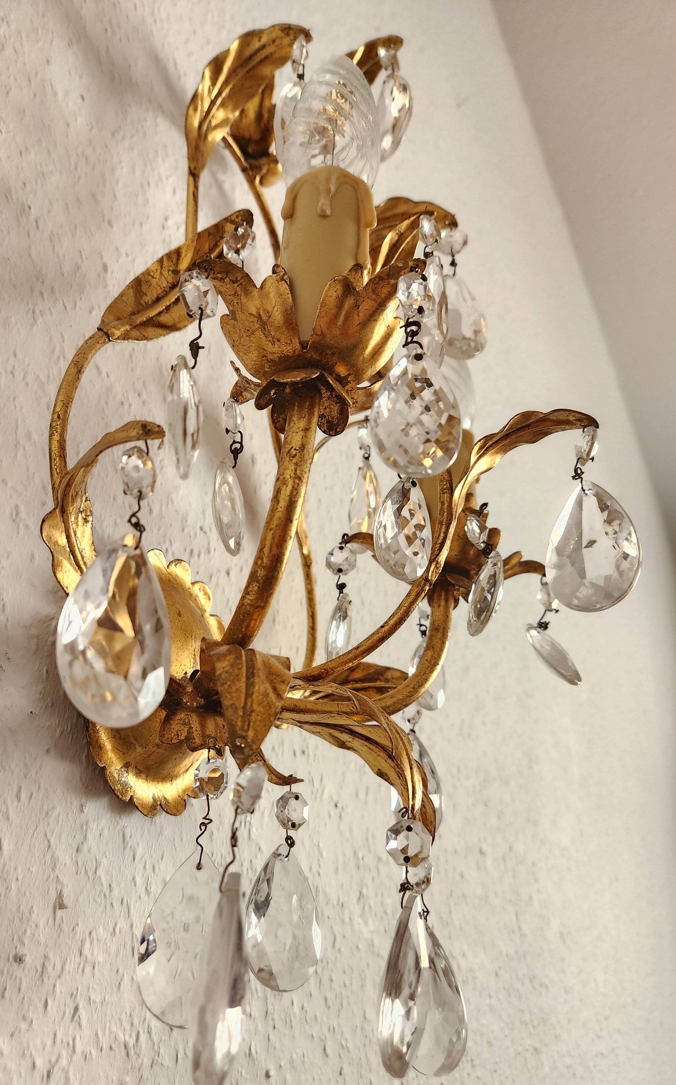 Hand-forged wall lamp gilded with gold leaf and crystals, Italy