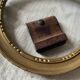 Small round frame in old gilded wood