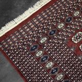 Handwoven red Boukhara oriental rug, 1960s