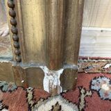 Miroir époque Louis Philippe à la feuille d'or.