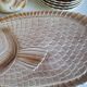 Many flat plates, dish, sauce boat, vegetable dish.