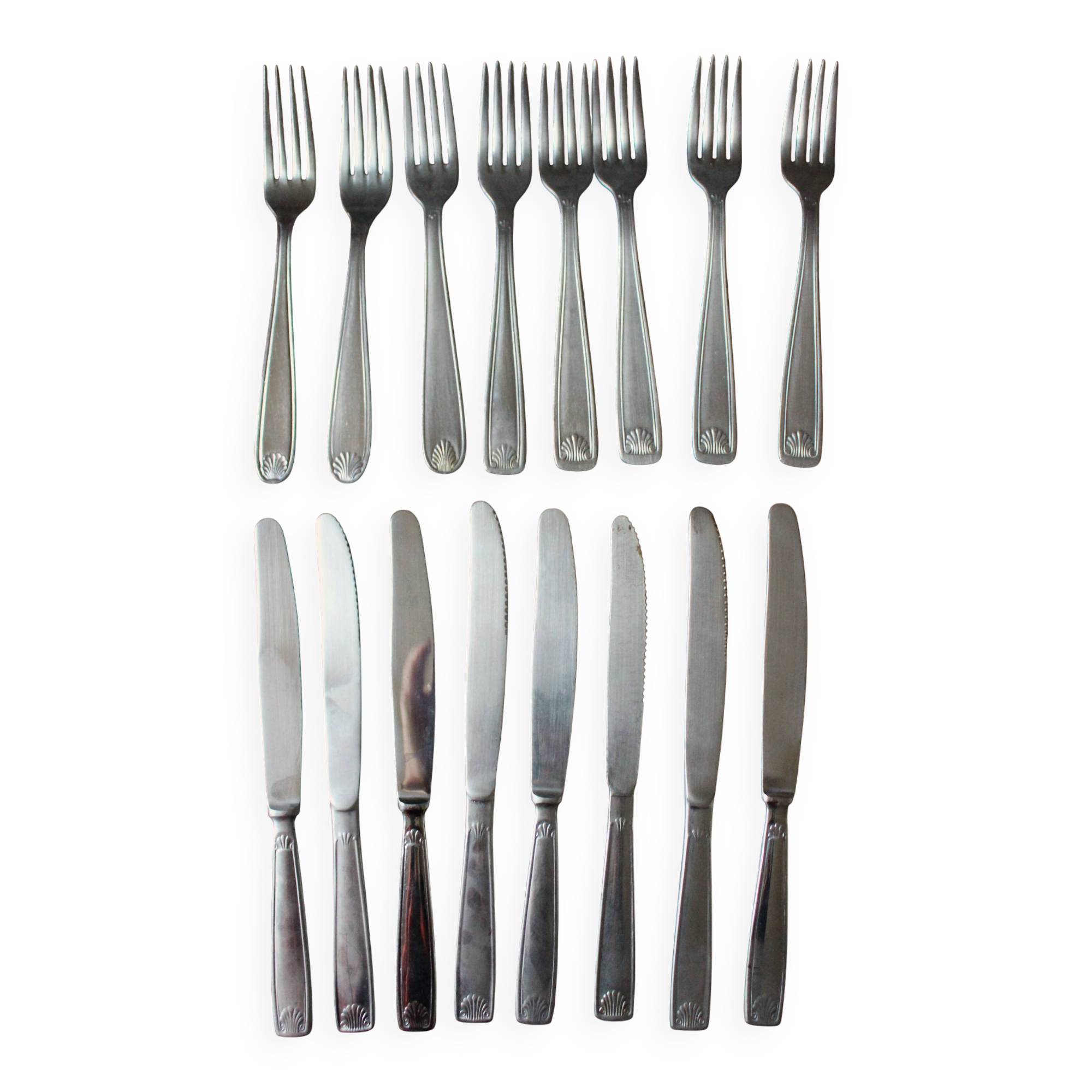 Mismatched set of 8 forks + 8 vintage shell stainless steel knives