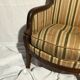 Fauteuil bergère aux dauphins époque Restauration