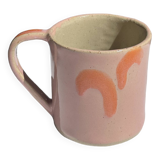 pink and orange mug
