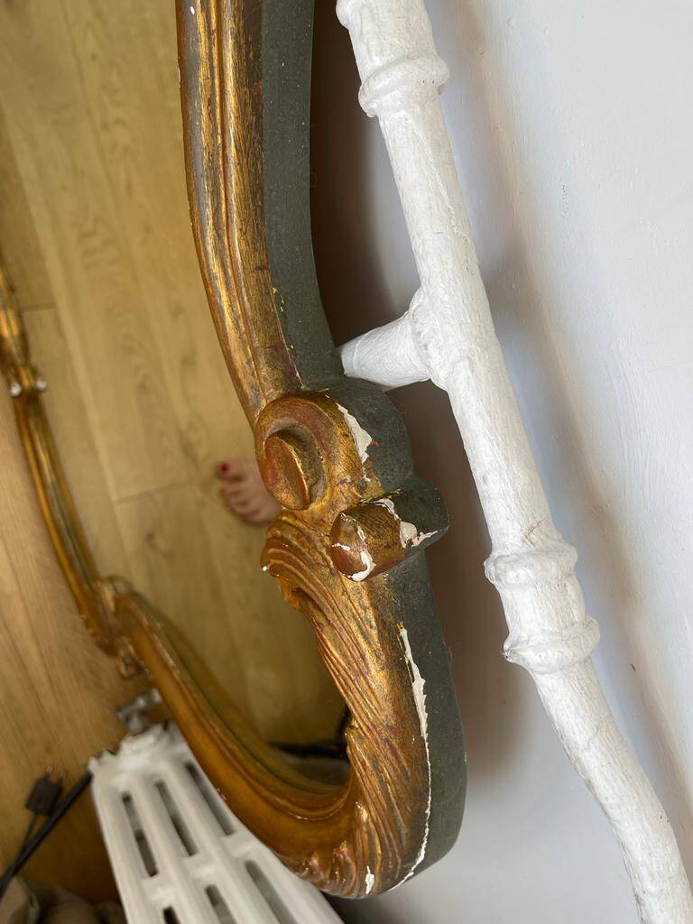 Antique gilded old mirror