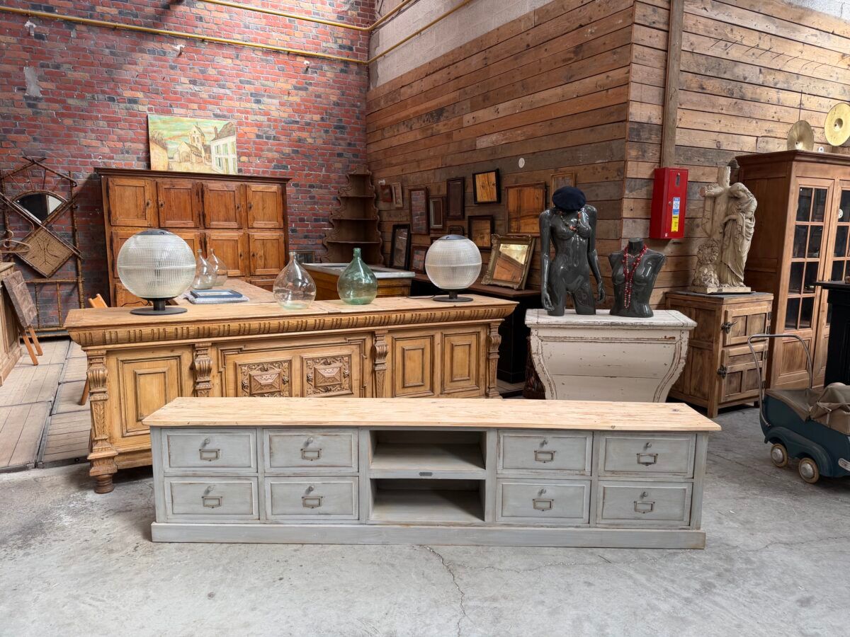 Old workshop furniture transformed into a TV unit.