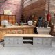 Old workshop furniture transformed into a TV unit.