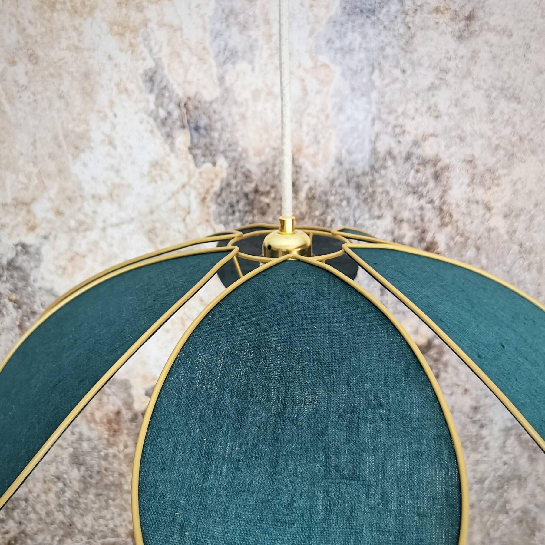 Flower suspension with metal structure and peacock blue linen petals