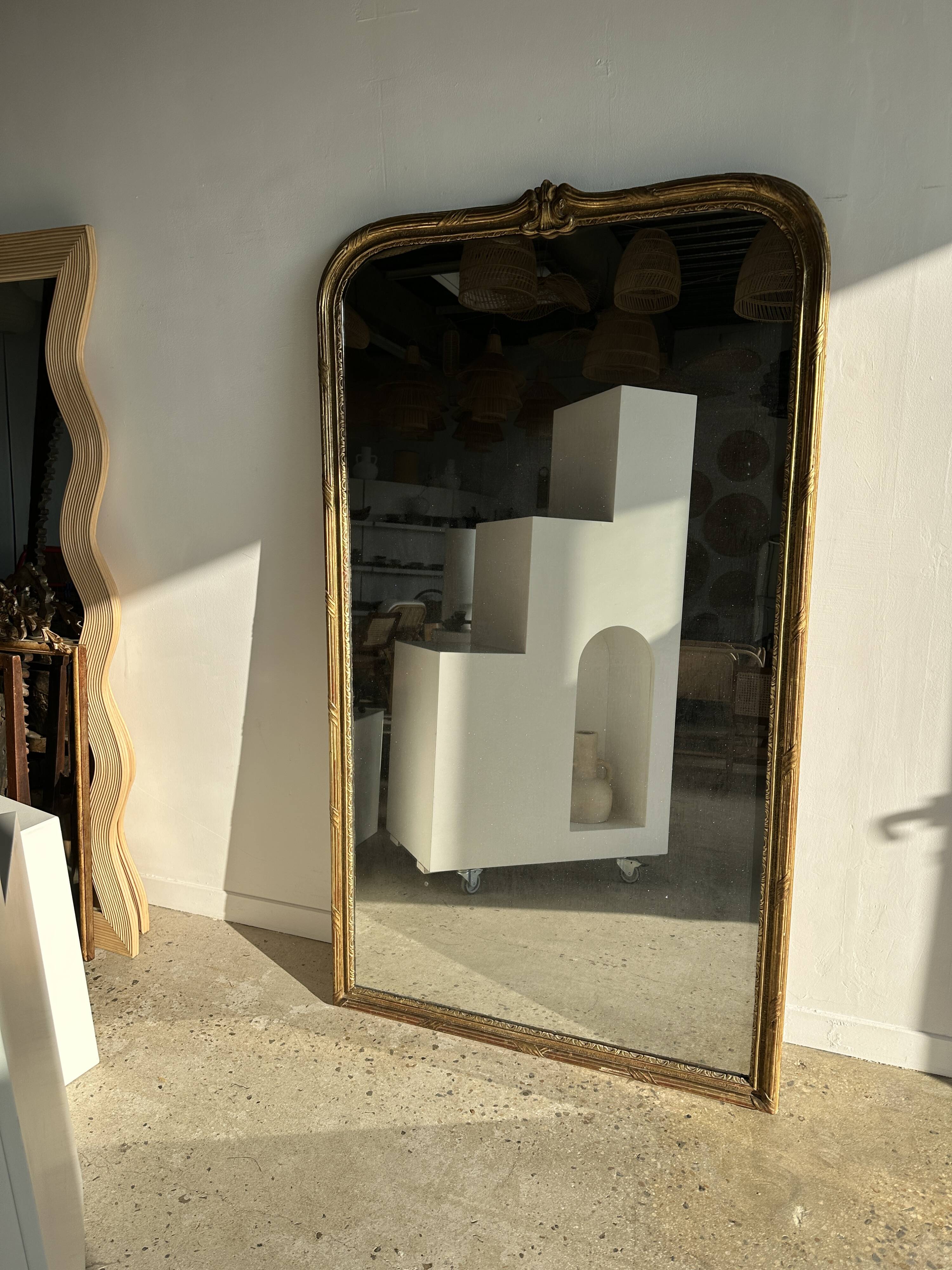 Large gilded mirror 19th century rounded corners mercury glass Louis XVI style