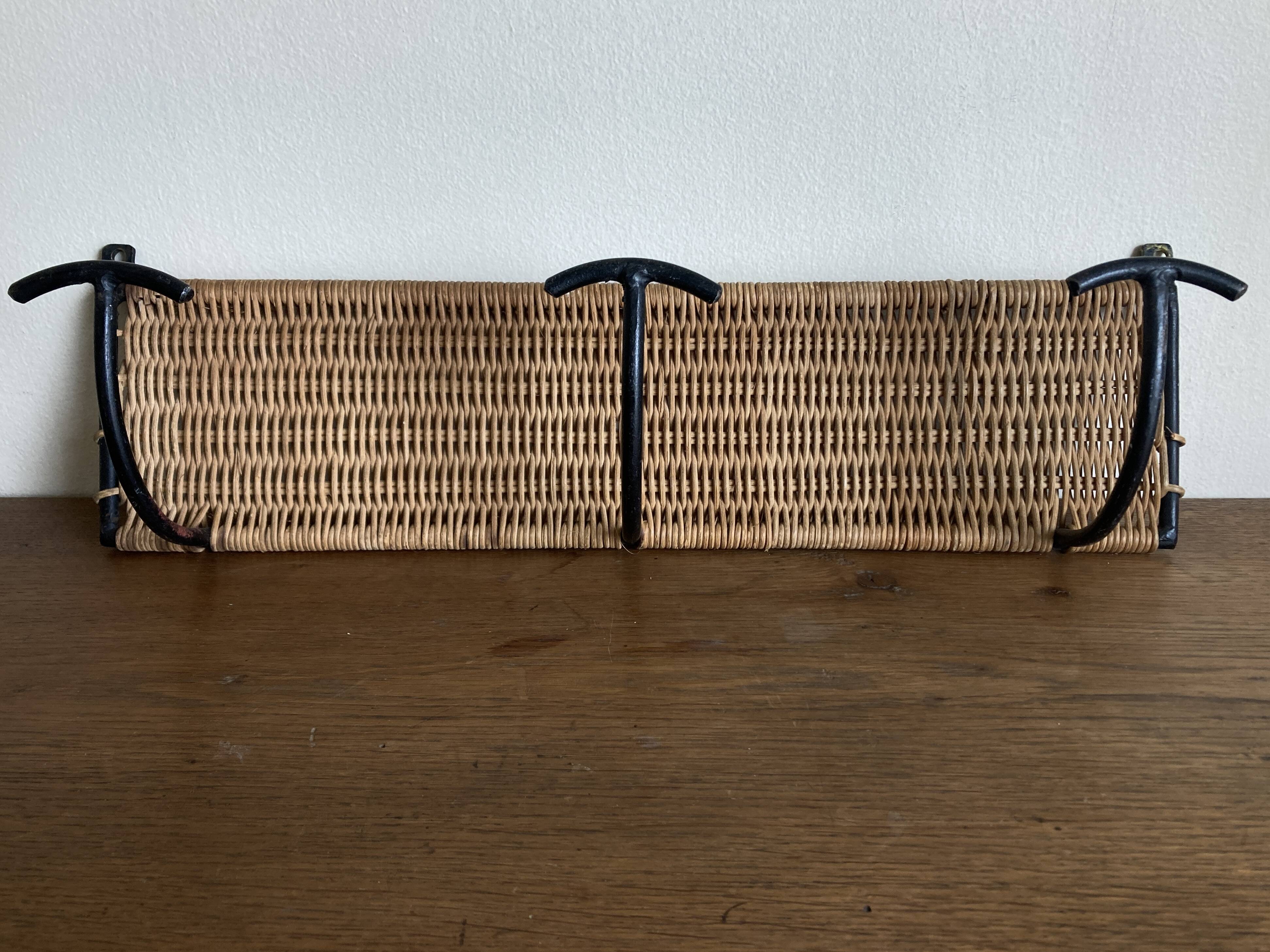 Raoul Guys mid-century iron and wicker wall coat rack