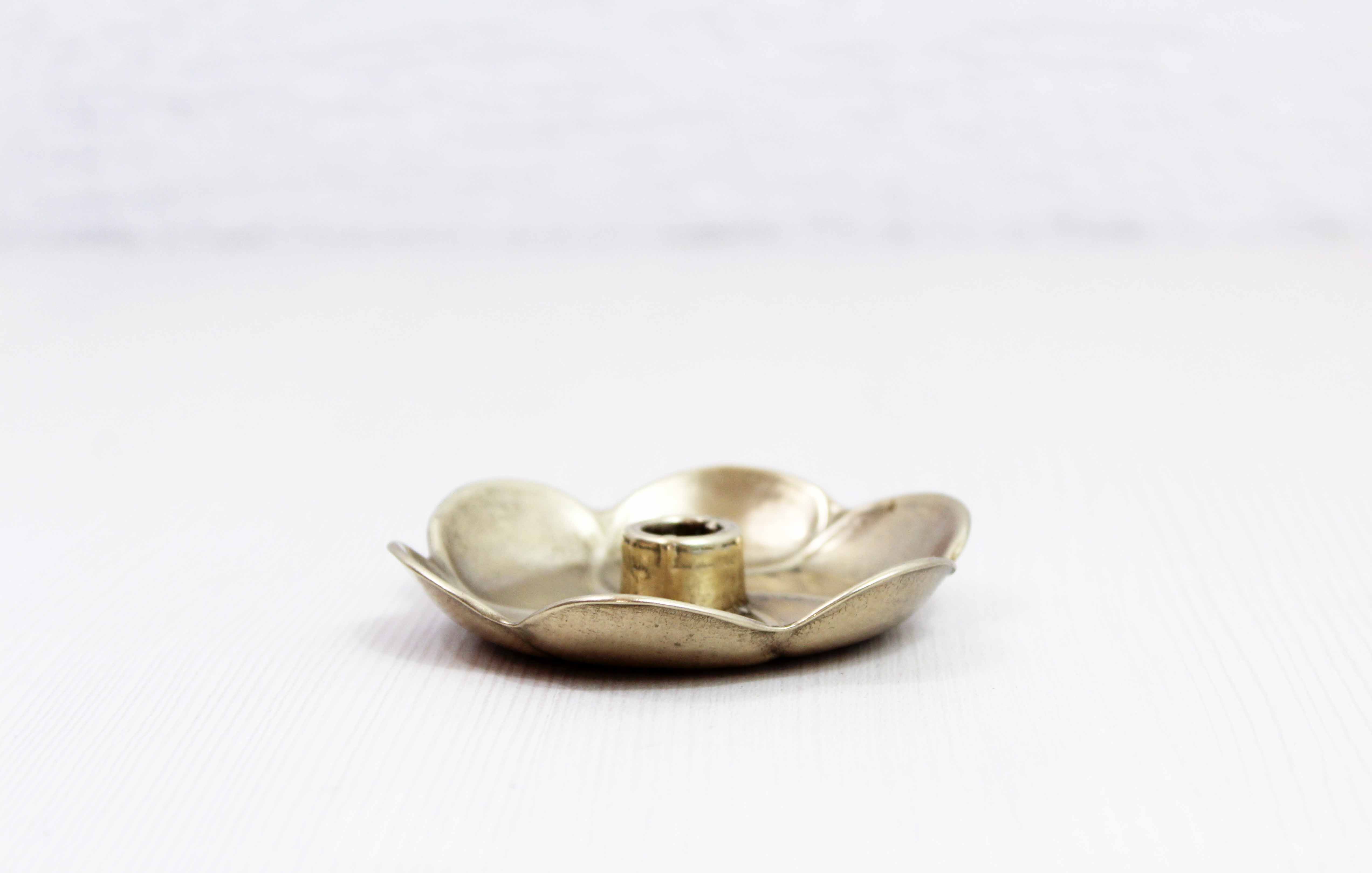 Brass flower candle holder