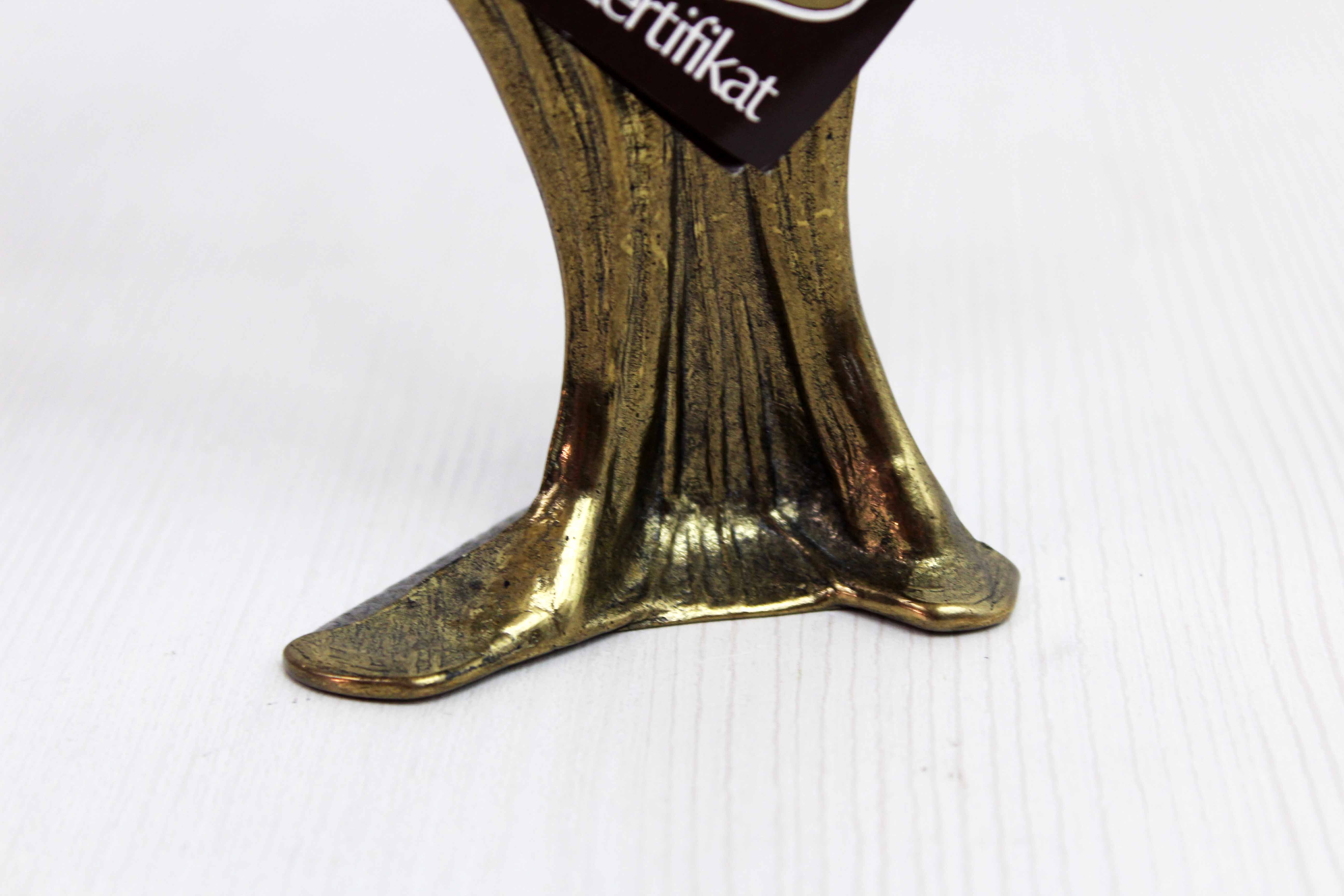 Art Nouveau brass flower candle holder