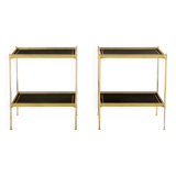 Pair of neoclassical side tables in brass and black leather by Maison Jansen, 1960.