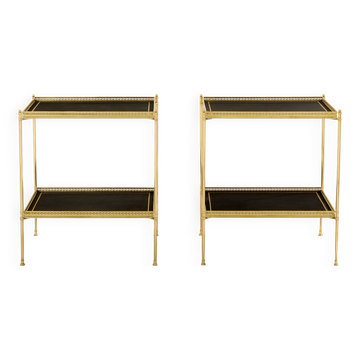 Pair of neoclassical side tables in brass and black leather by Maison Jansen, 1960.