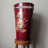 Antique metal umbrella stand with hand-painted floral decor, bohemian countryside