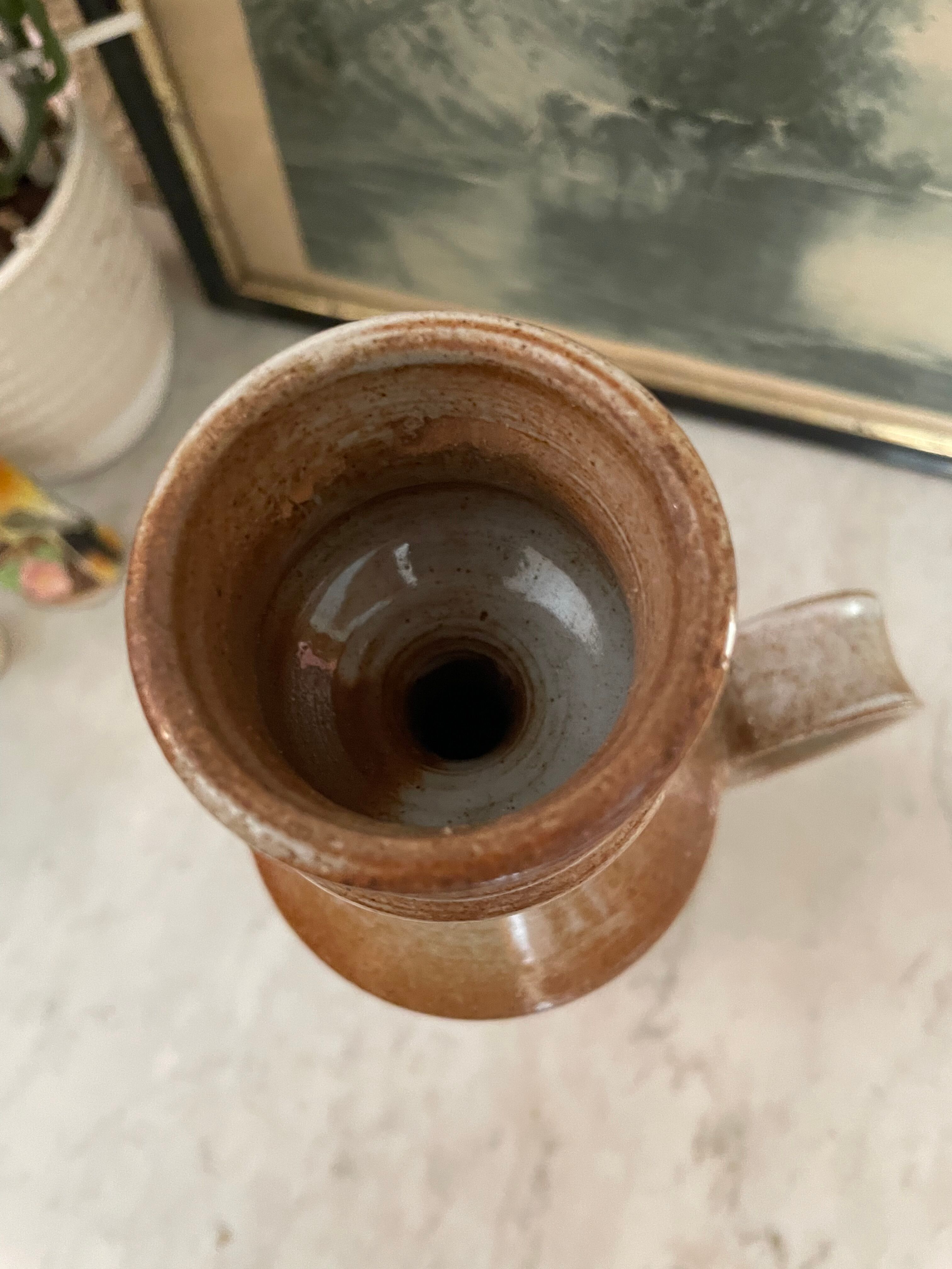 Signed sandstone decanter