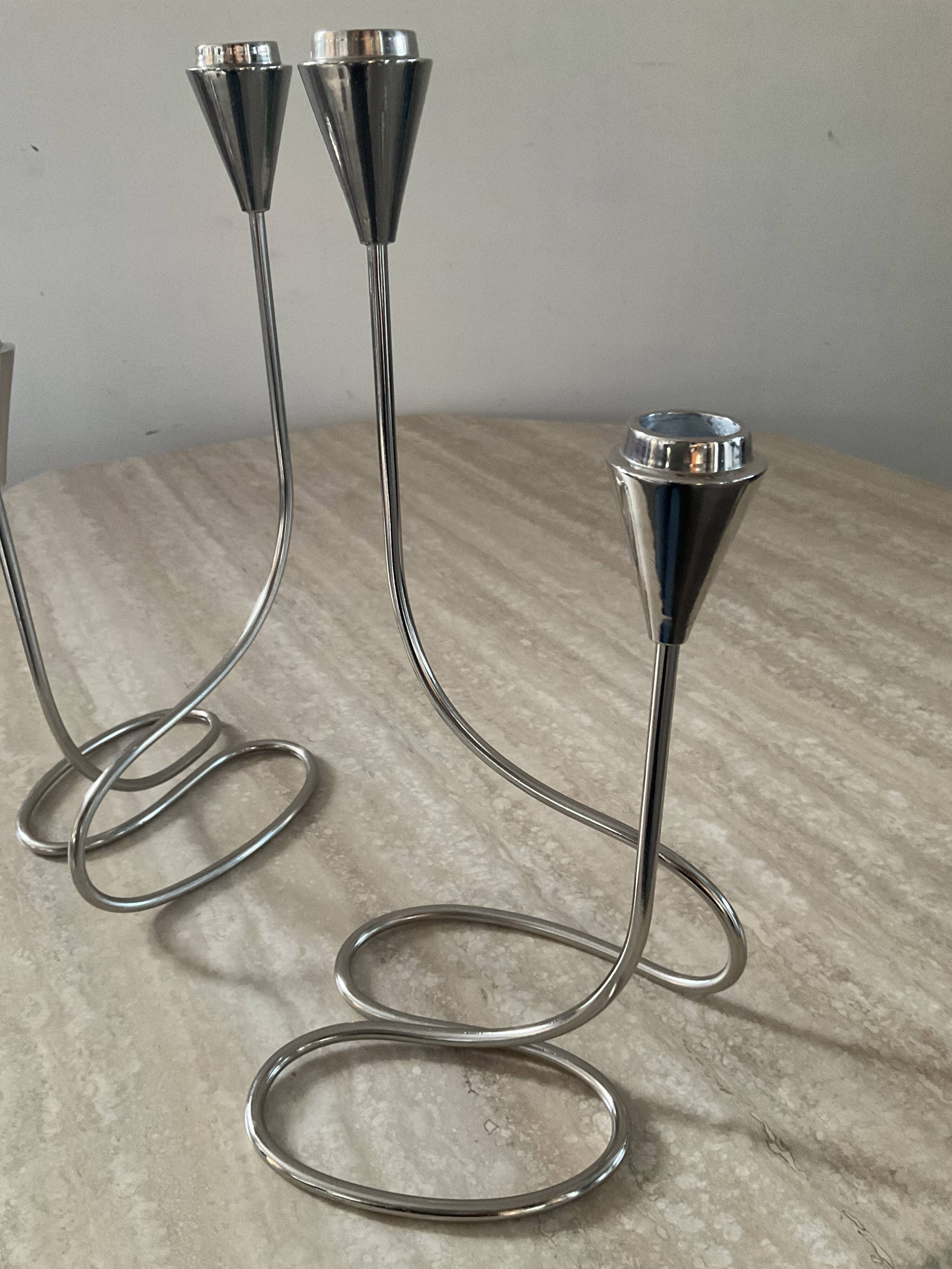 Pair of modernist silver metal candlesticks